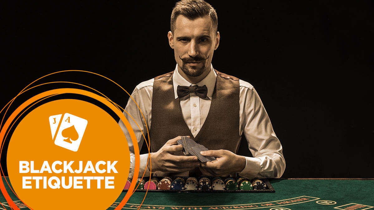 Blackjack dealer shuffling cards at the table