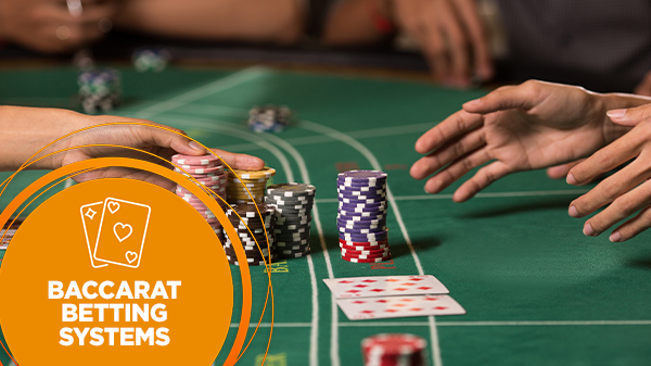Hands of players winning chips at the baccarat table.