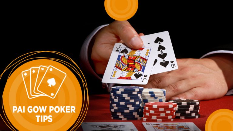 Player shows cards in Pai Gow Poker game.