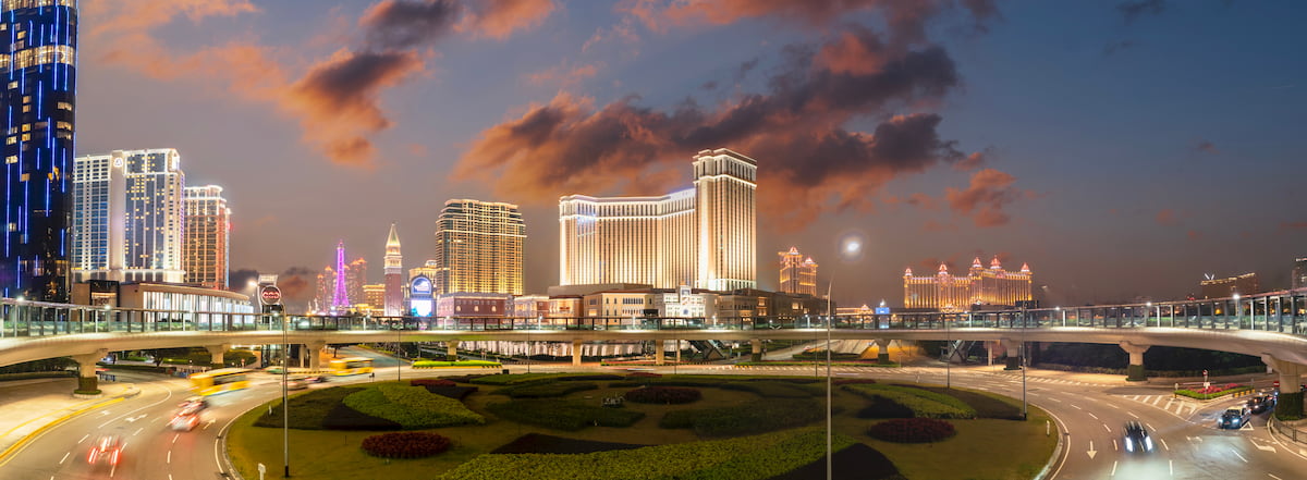 A hotel in Macau at night lit by light