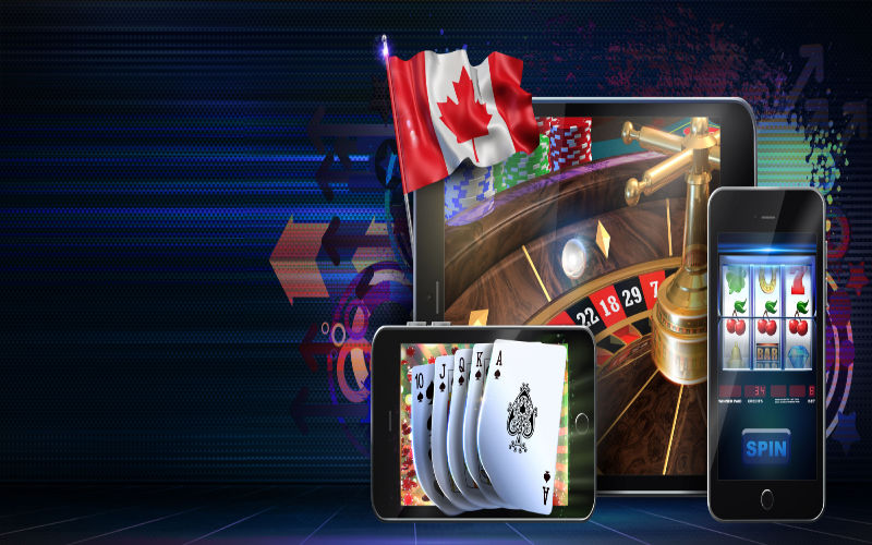 The Canadian Flag along with a mobile phone and computer screen being used for gambling