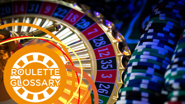 Roulette wheel and casino chips.