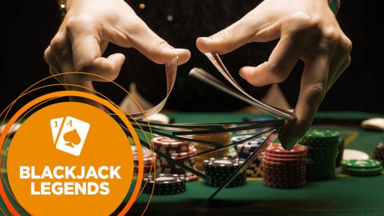 Blackjack dealer in process of shuffling cards