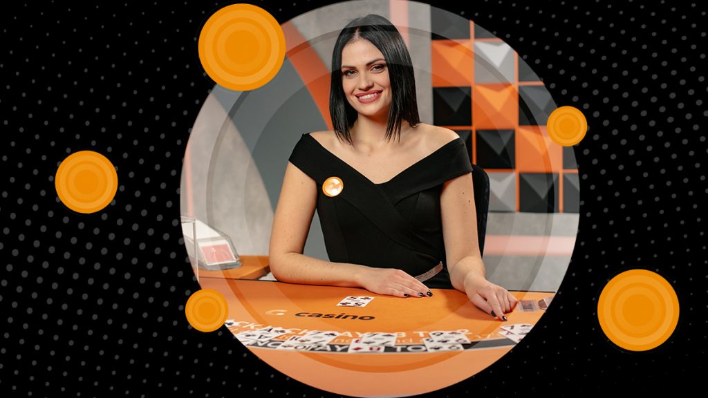 Live casino dealer at Casino.com.