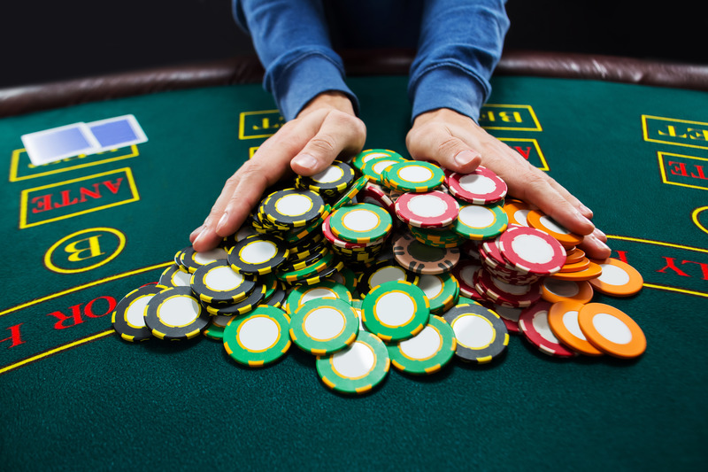 Green and Red poker chips Casino online game All in hands