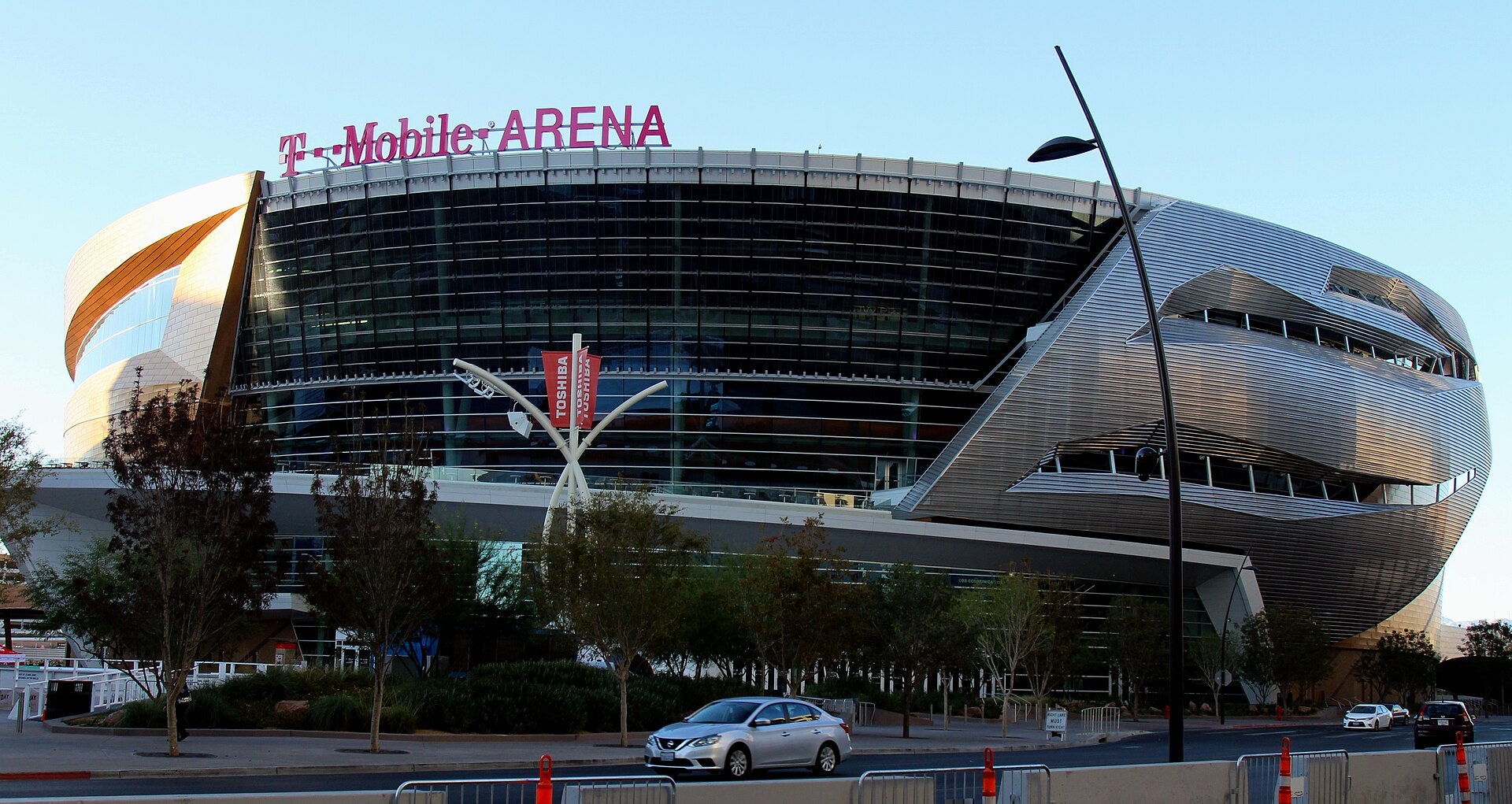 Exterior view of T-Mobile Arena in Las Vegas with Toshiba Plaza banners visible