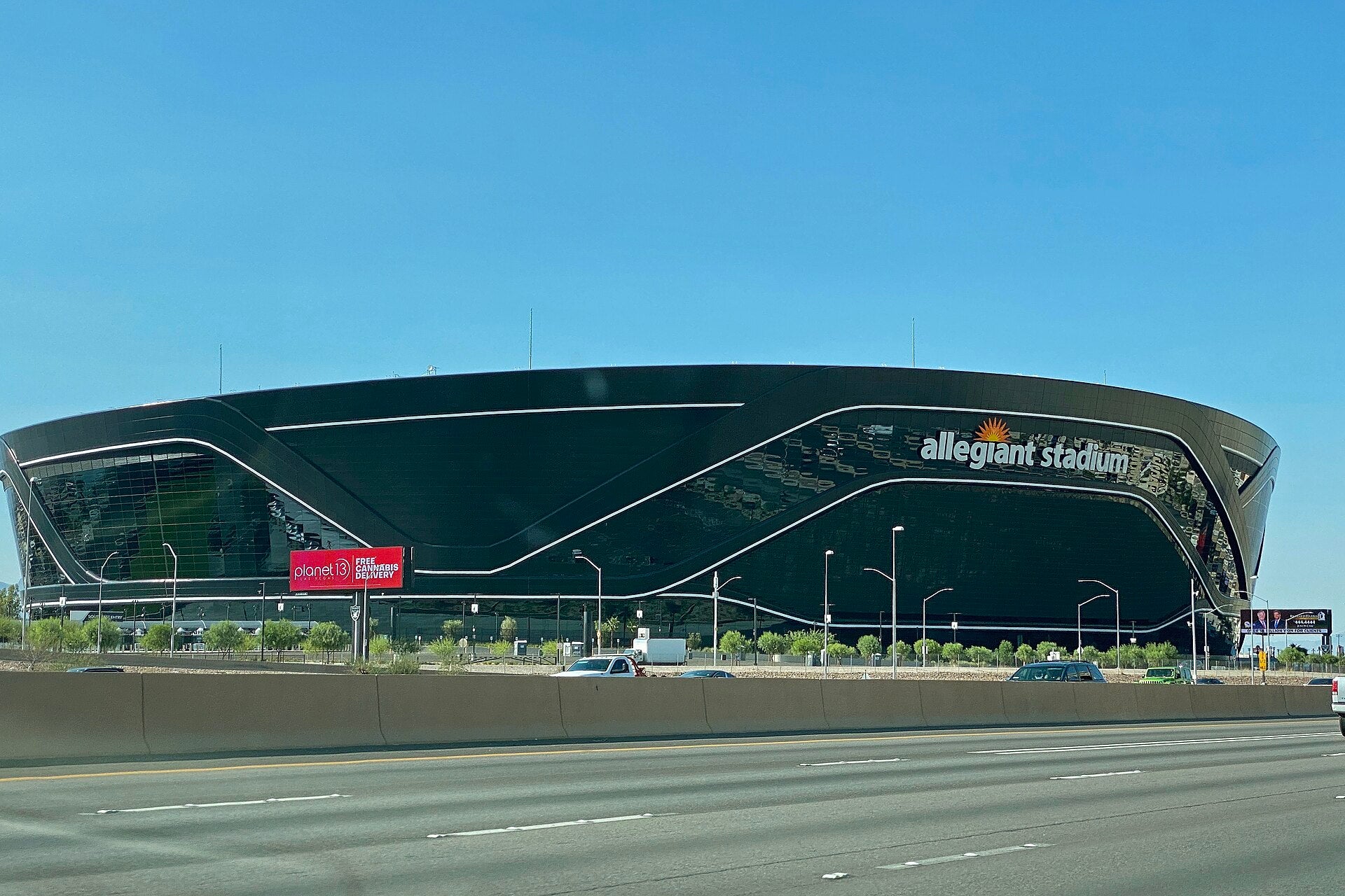 Allegiant Stadium in Las Vegas, home of the Raiders, viewed from the freeway on a clear day