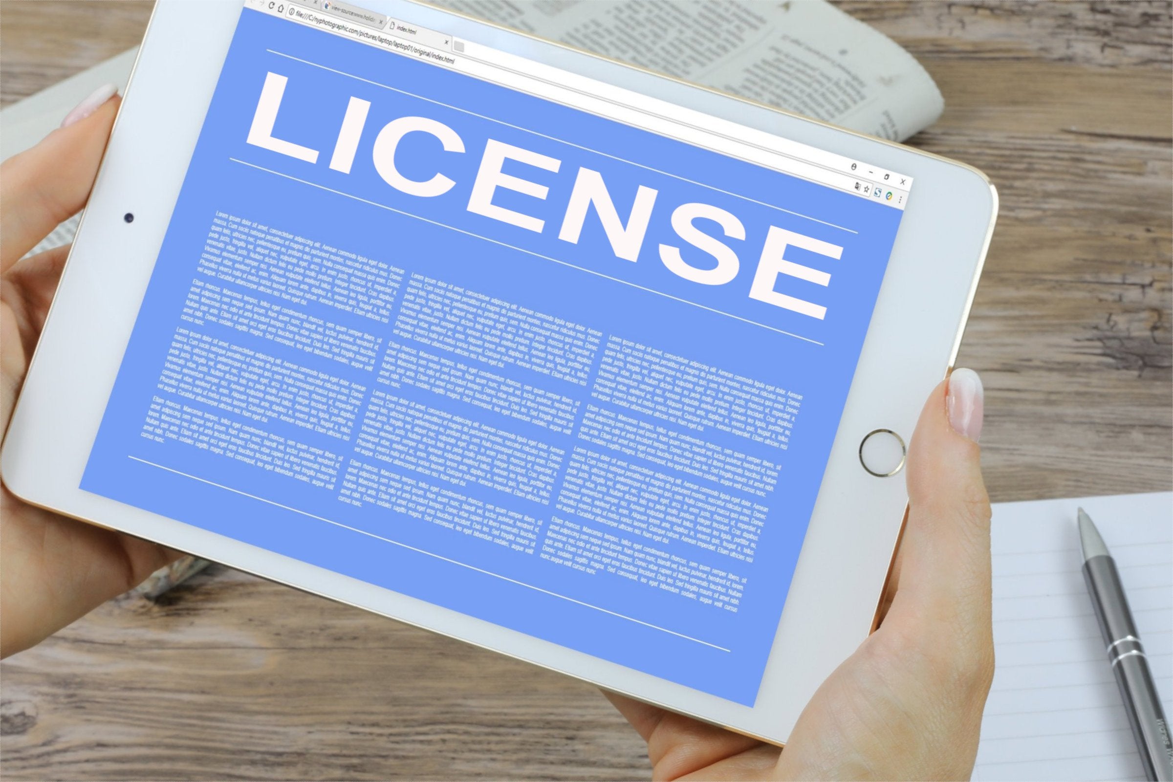 Games Global Secures AGLC Registration for Alberta Entry Tablet displaying a digital license document, symbolizing Alberta’s regulated iGaming framework