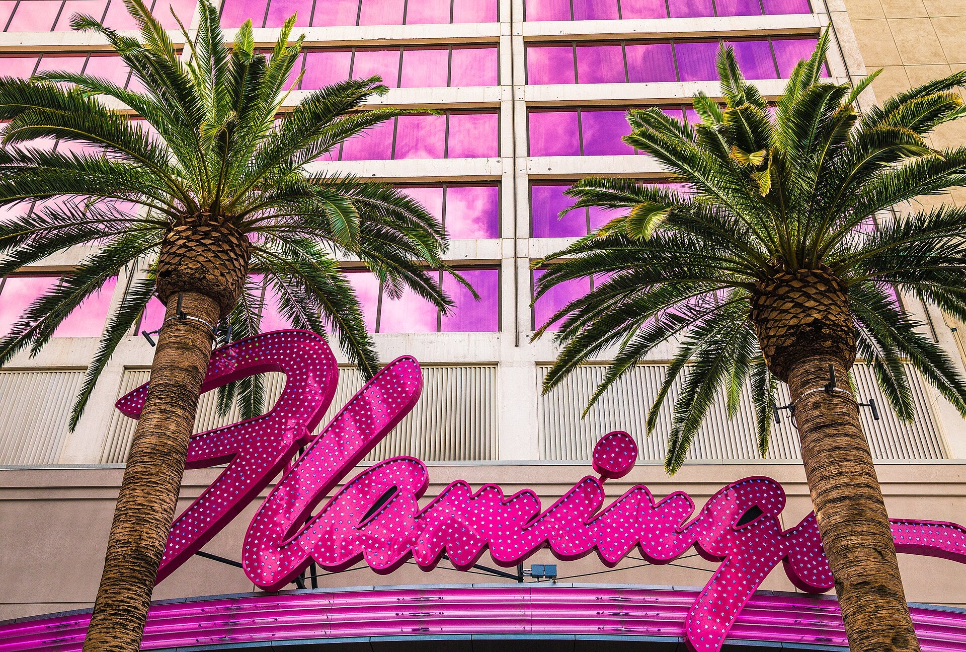 Las Vegas Flamingo Case: Canadian Tourist Found Guilty Pink neon Flamingo sign framed by palm trees outside the Flamingo Las Vegas Hotel & Casino on the Las Vegas Strip