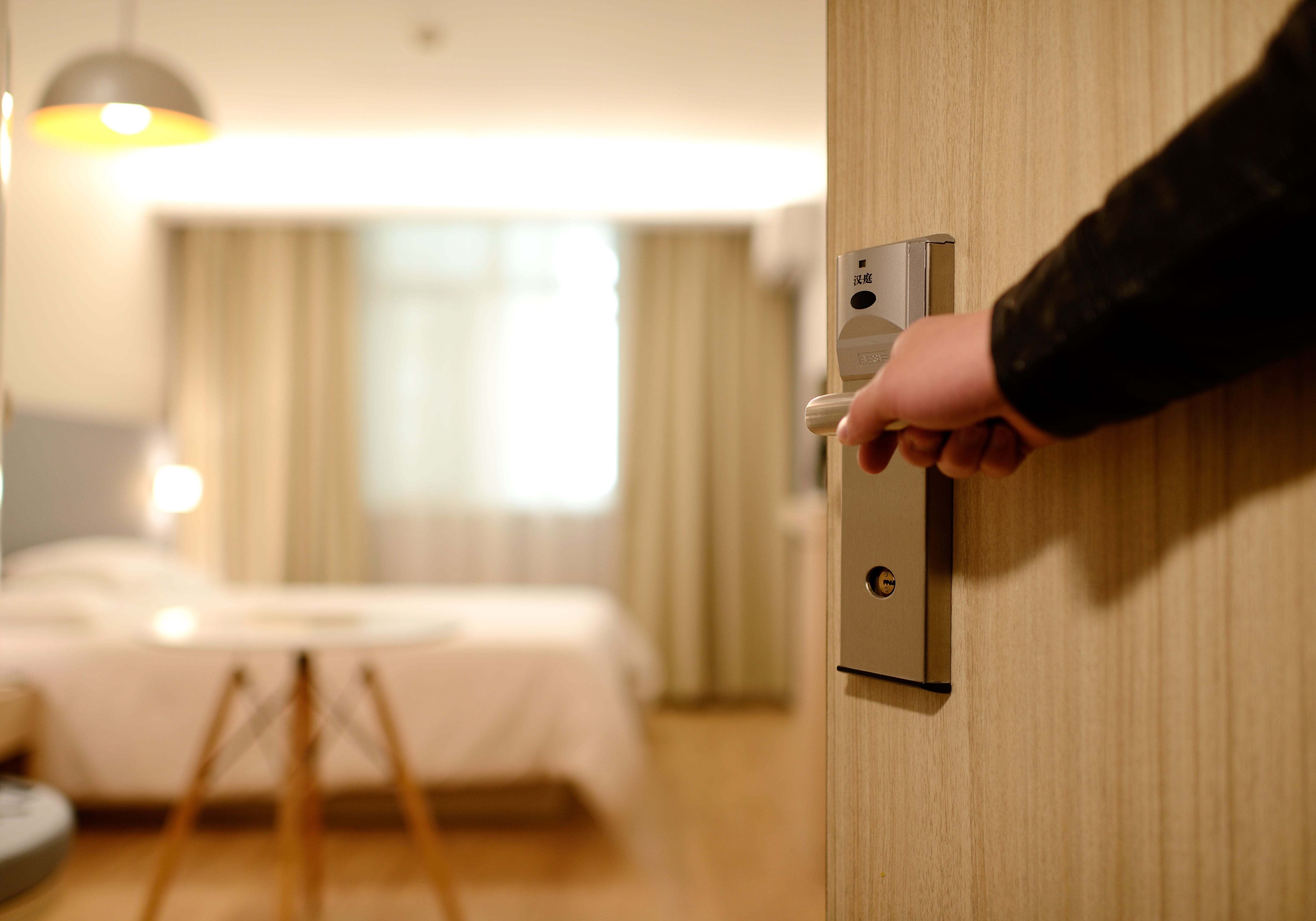 Hotel room door with key card lock, representing new rooms at Circa Resort and Casino