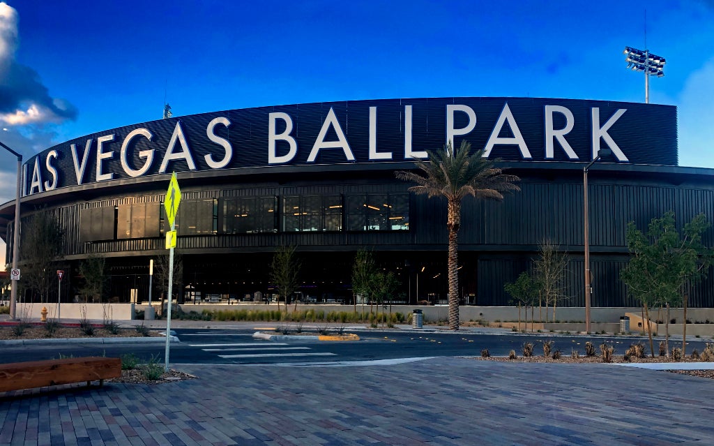 A's Beat Rockies 6-4 at New Las Vegas Ballpark Opener Exterior view of Las Vegas Ballpark with large signage, home of the Las Vegas Aviators and future A's training site