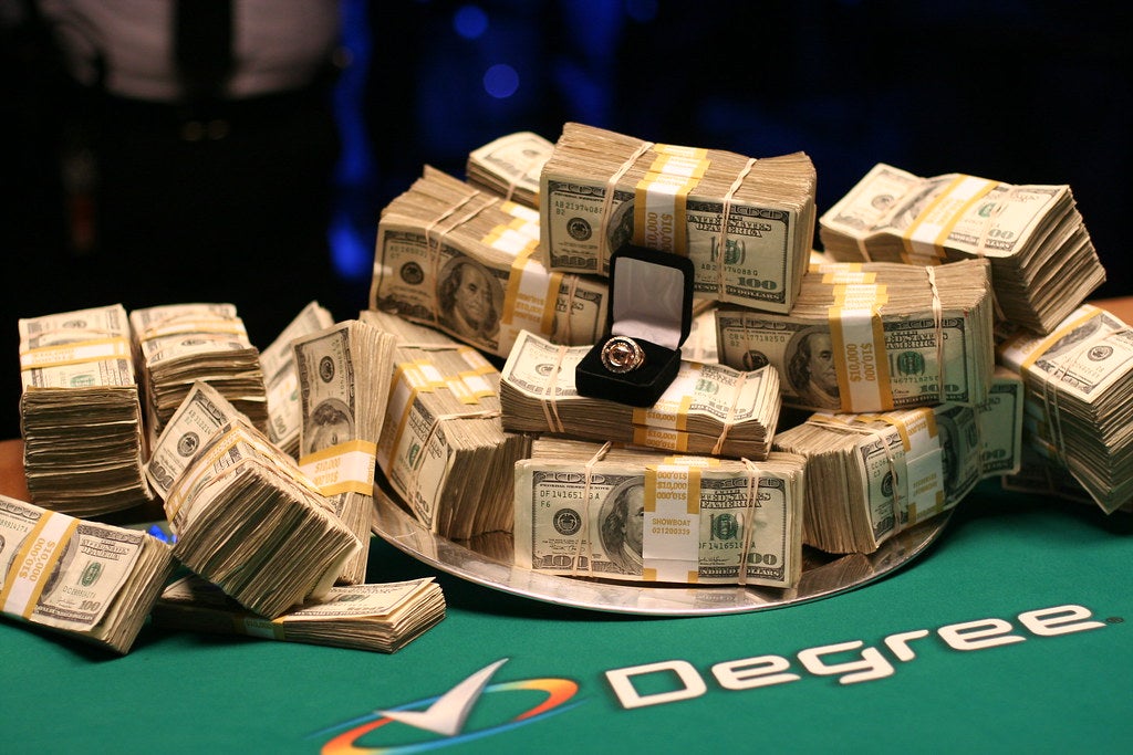 WSOP Circuit Ring on Bundles of Cash