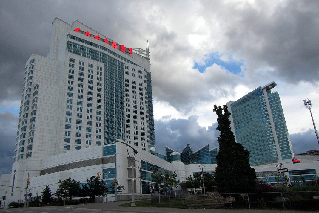 Exterior view of Caesars Windsor hotel and casino building under cloudy skies