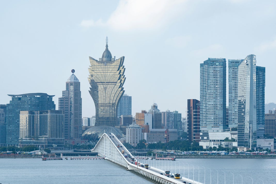 Skyline of Macau featuring the Grand Lisboa and waterfront bridge