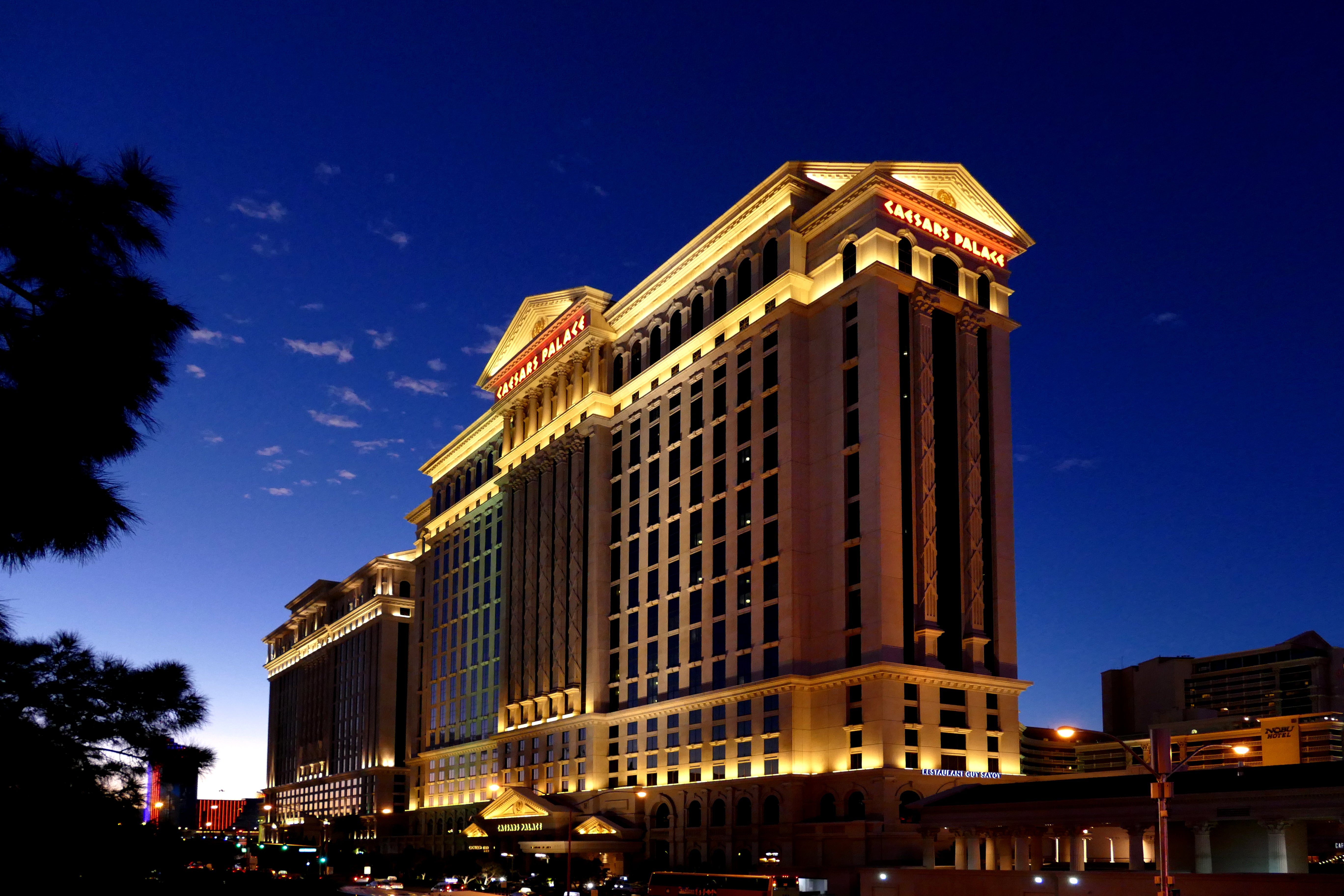 Caesars Palace hotel and casino illuminated at night in Las Vegas
