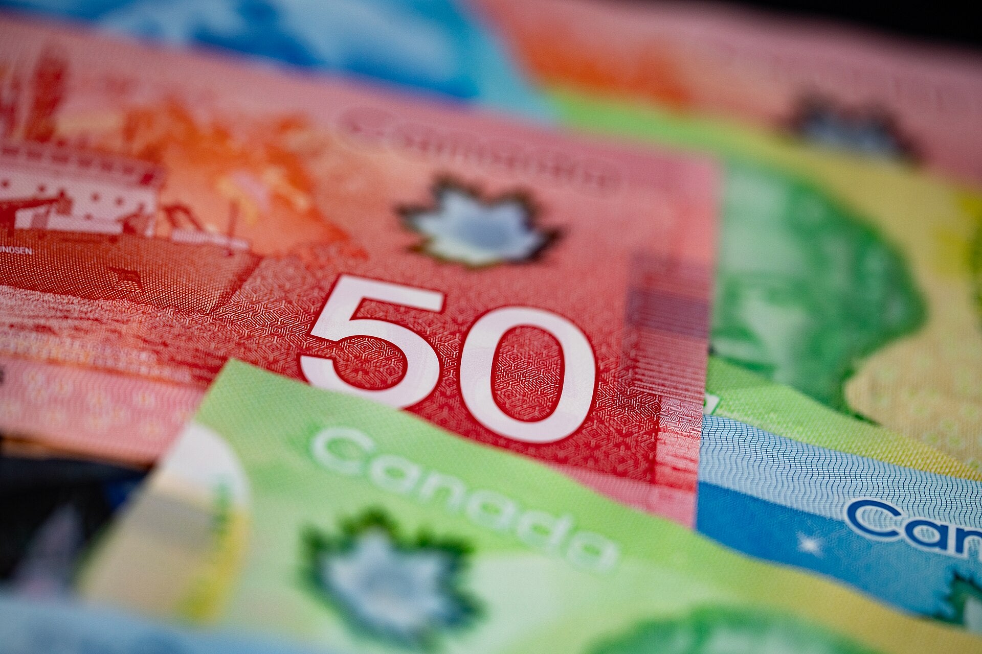 At Par Promotion Brings 120,000 Canadians to Vegas Close-up of Canadian dollar bills, including a red $50 note, representing the currency used in Circa's At Par promotion