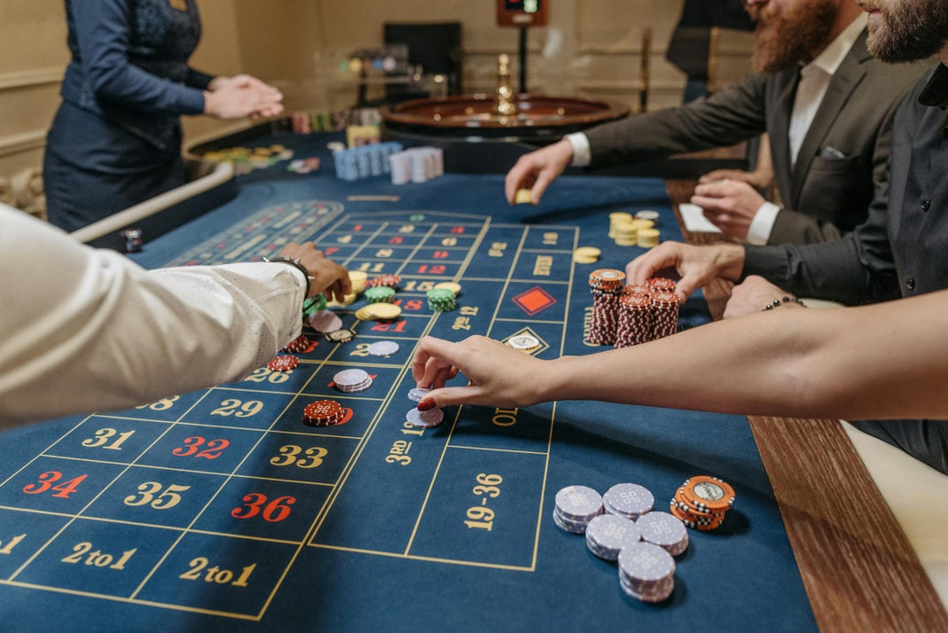 People Playing Roulette at a Casino