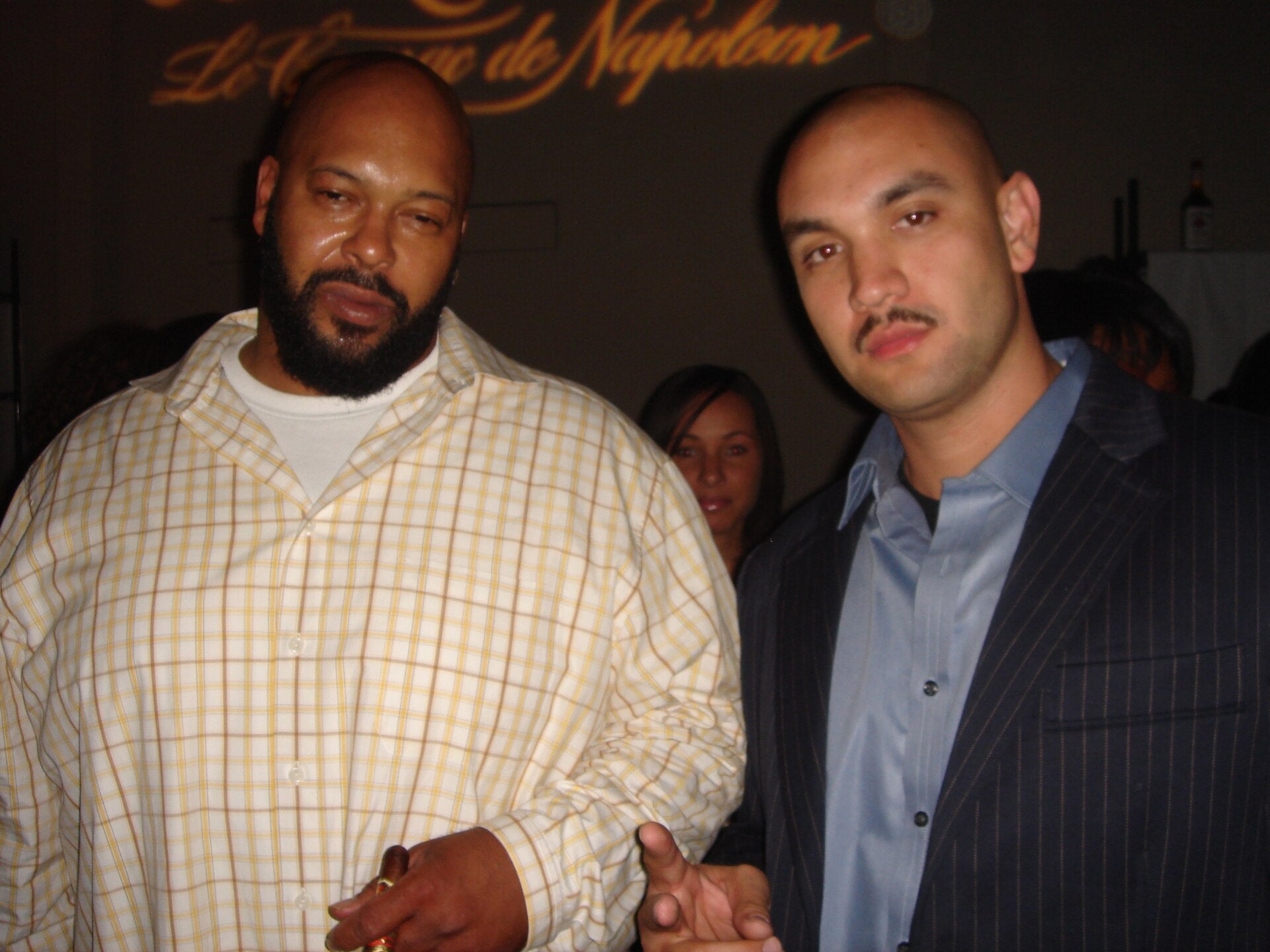 Suge Knight poses with Nick Leisure at a nightclub event