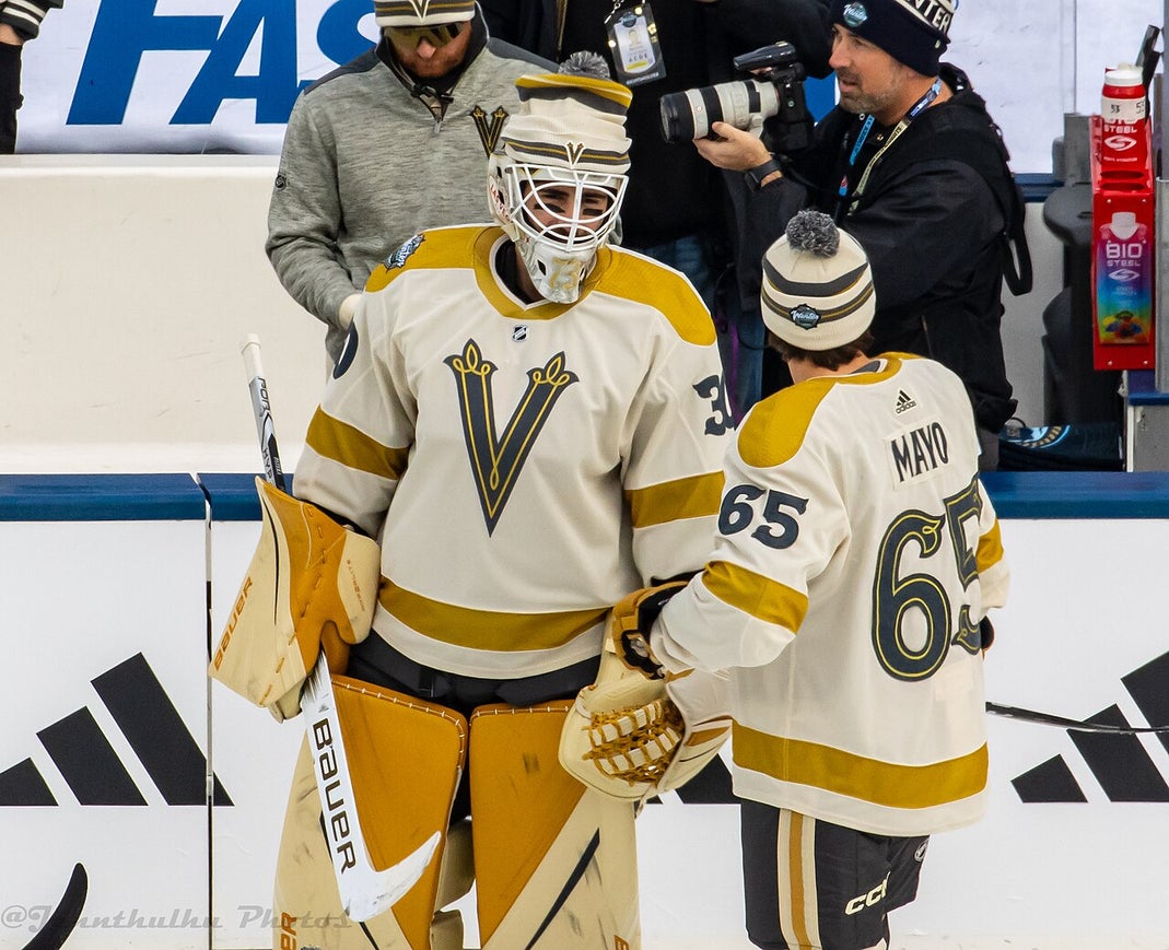 Vegas Golden Knights goalie Jiří Patera and defenseman Dysin Mayo during warmups at the 2024 NHL Winter Classic against the Seattle Kraken