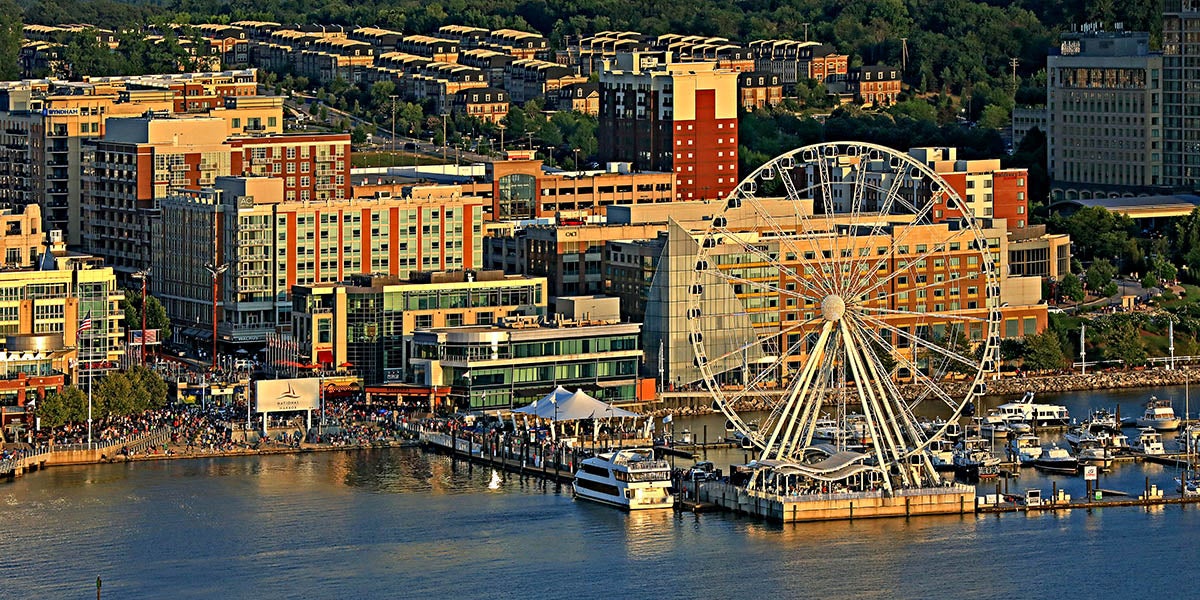 Sphere National Harbor: New Plans Show 302-Ft Venue Aerial view of National Harbor waterfront with the Capital Wheel, near the proposed Sphere National Harbor site
