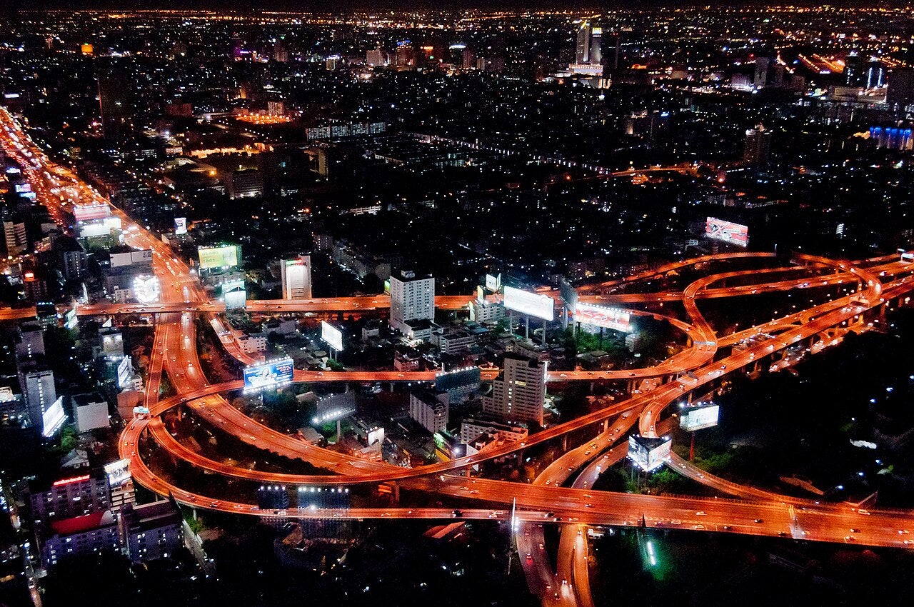 Makkasan Interchange expressway network at night in Bangkok, Thailand