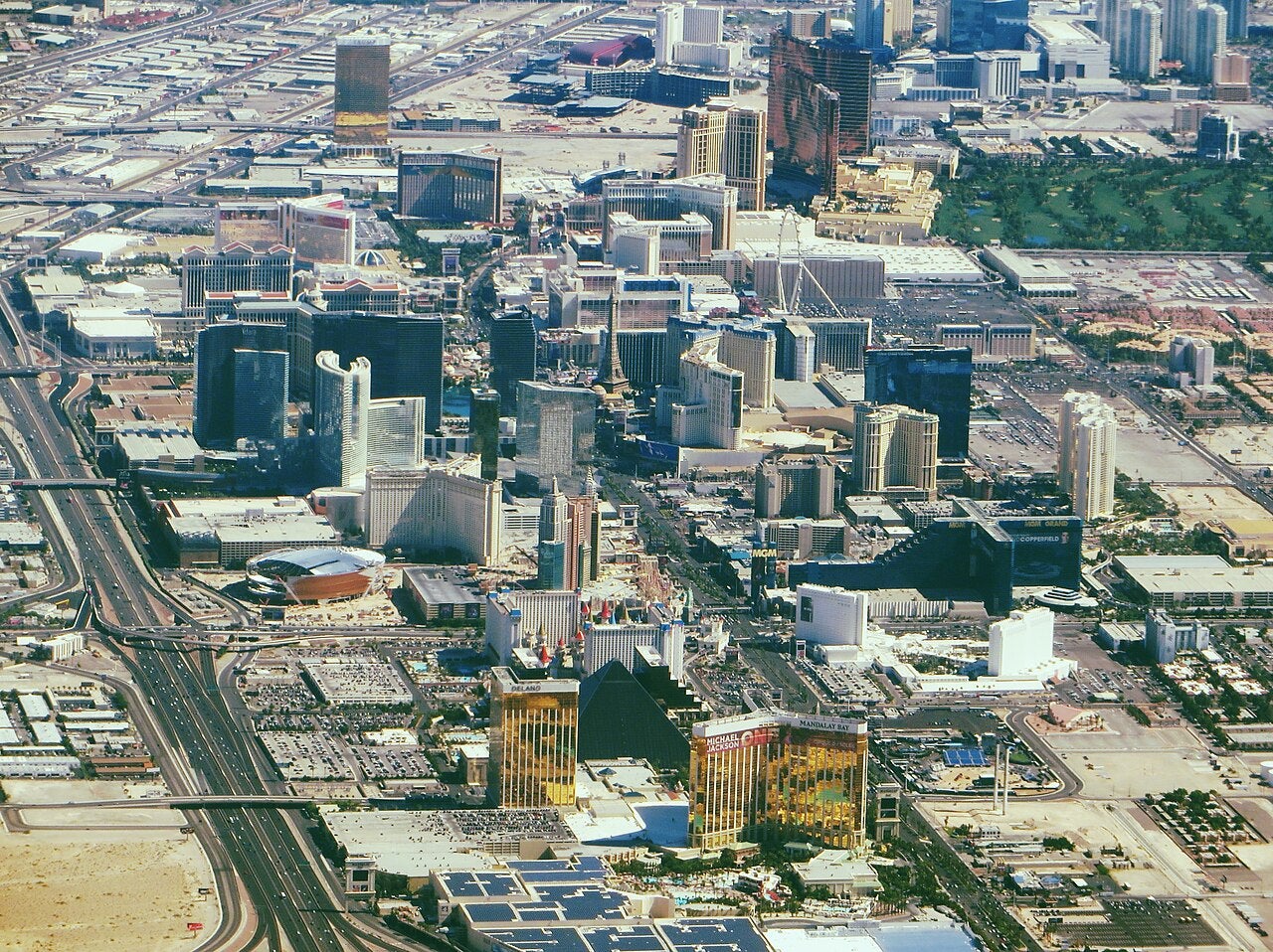 Las Vegas Strip aerial skyline with Mandalay Bay and Luxor resorts Aerial view of the Las Vegas Strip in Nevada showing Mandalay Bay, the Luxor pyramid, and surrounding resort casinos