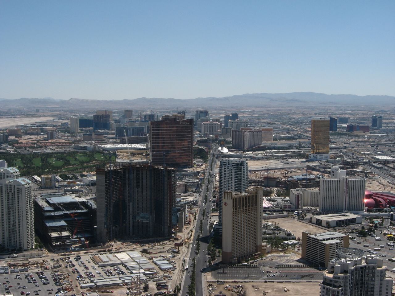 Aerial view of the Las Vegas Strip with hotel towers and an under-construction high-rise