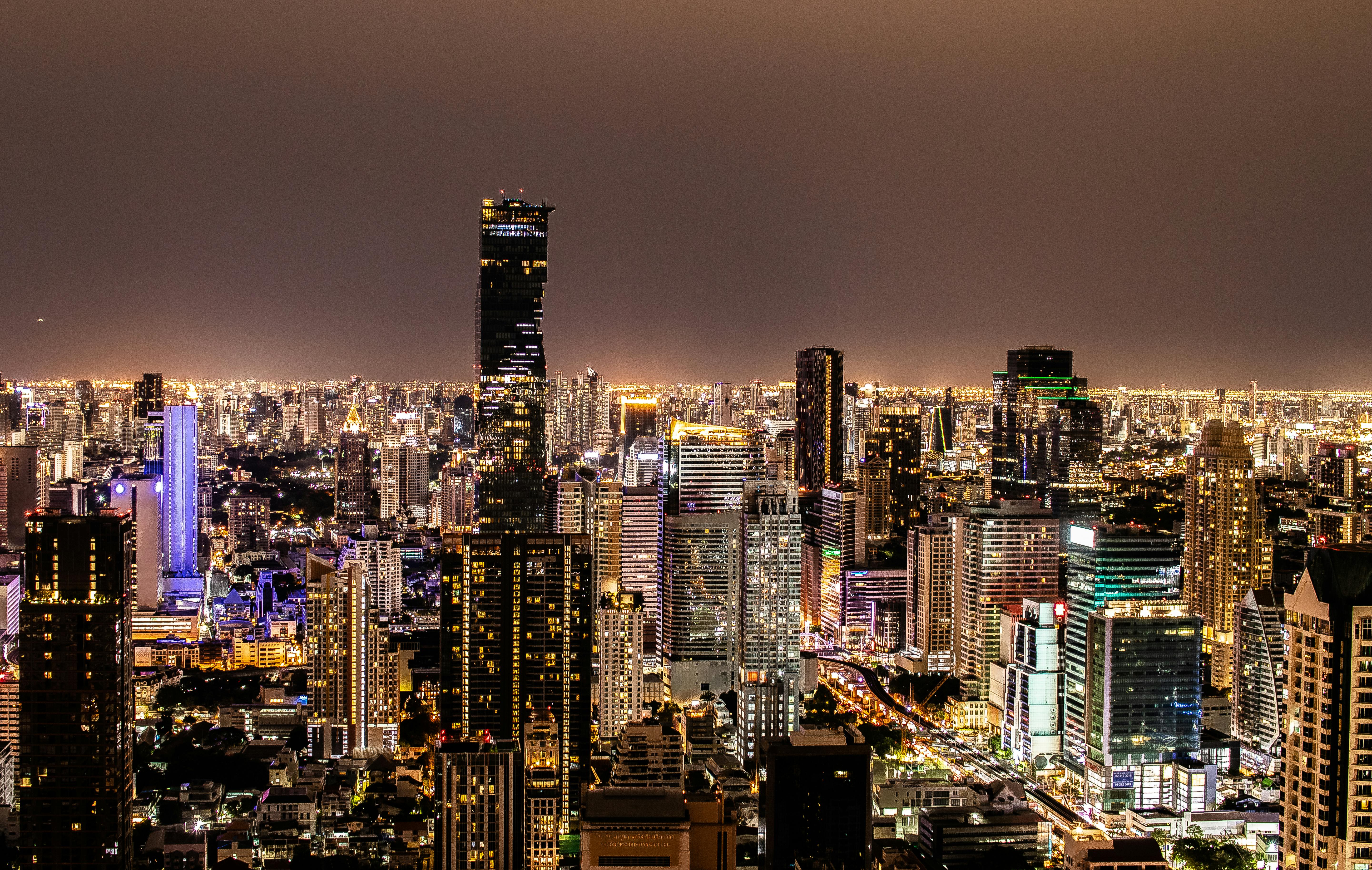 Stunning night skyline of Bangkok with illuminated skyscrapers and city lights