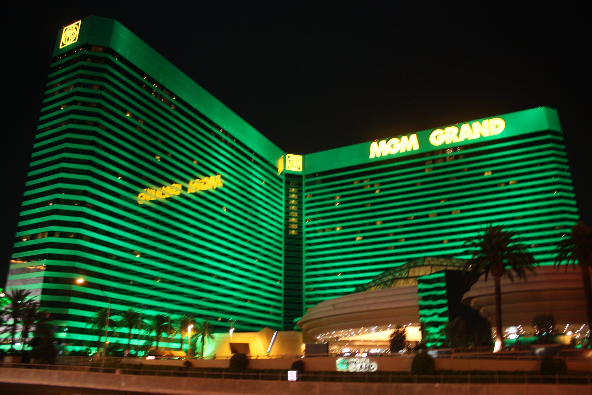 MGM Grand hotel and casino illuminated in green on the Las Vegas Strip at night