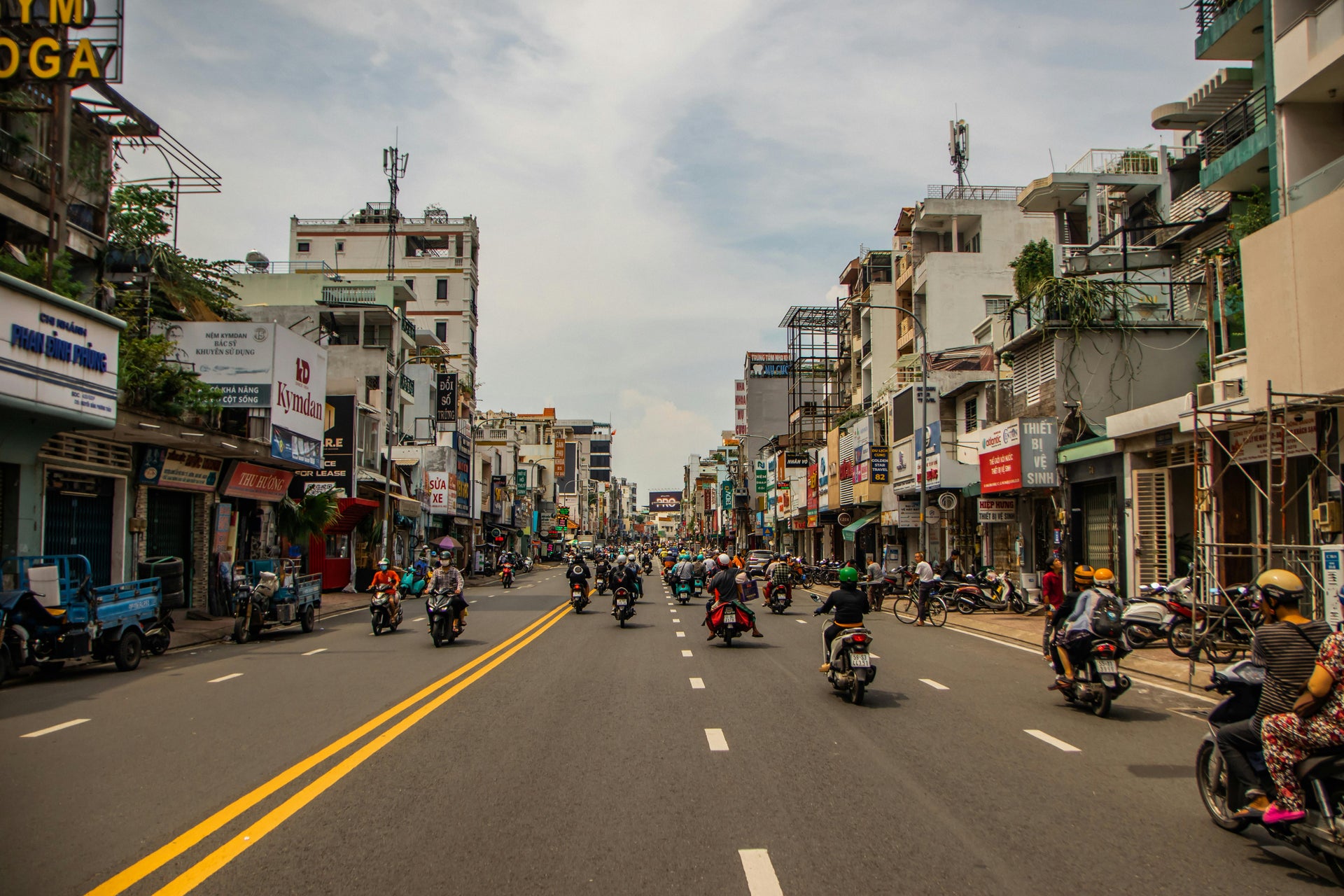 usy street with heavy motorbike traffic in Ho Chi Minh City, Vietnam