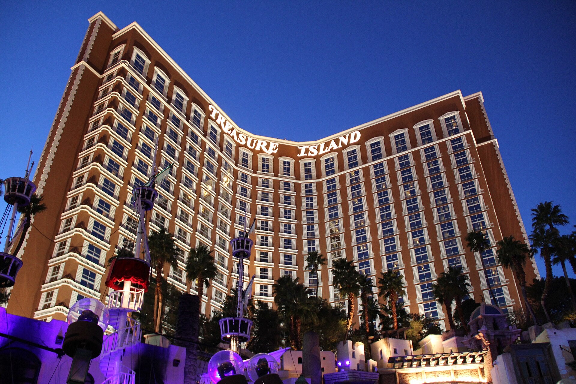 Treasure Island casino-hotel exterior lit up at night on the Las Vegas Strip