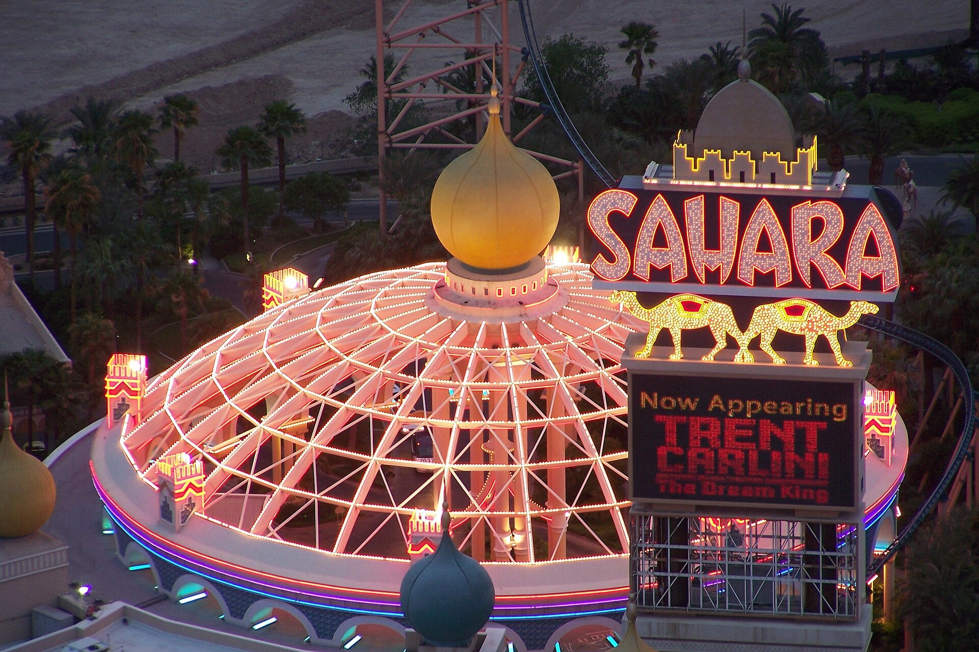 SAHARA Las Vegas Crypto: Fund Casino Play With Bitcoin Illuminated dome entrance and camel marquee sign at the Sahara casino on the Las Vegas Strip at dusk