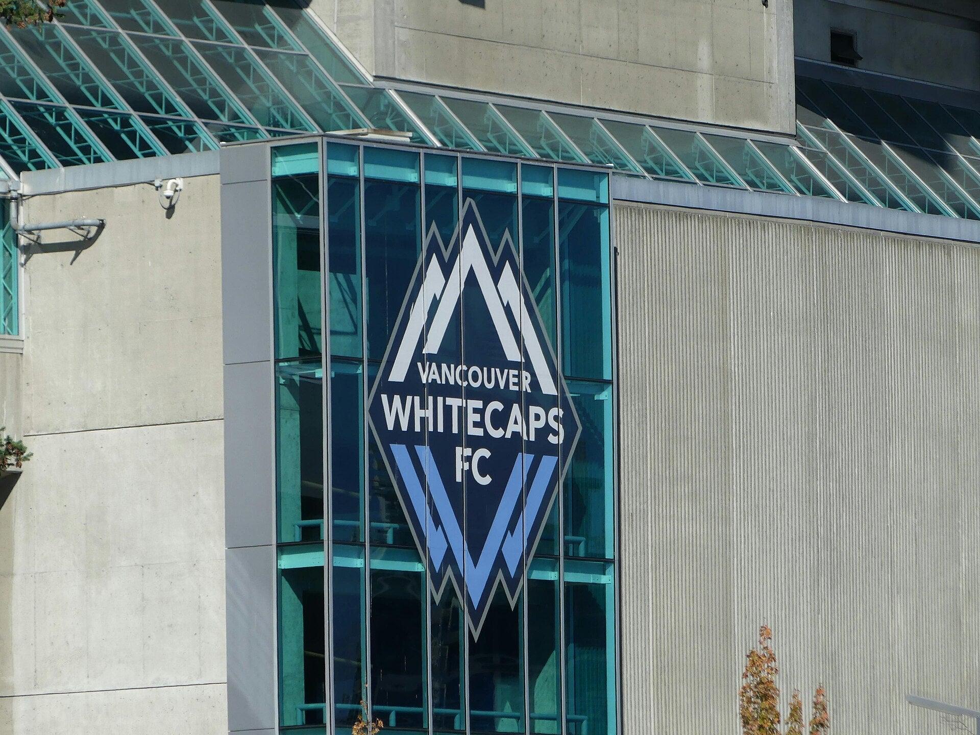 Vancouver Whitecaps FC logo displayed on the exterior of B.C. Place stadium in Vancouver