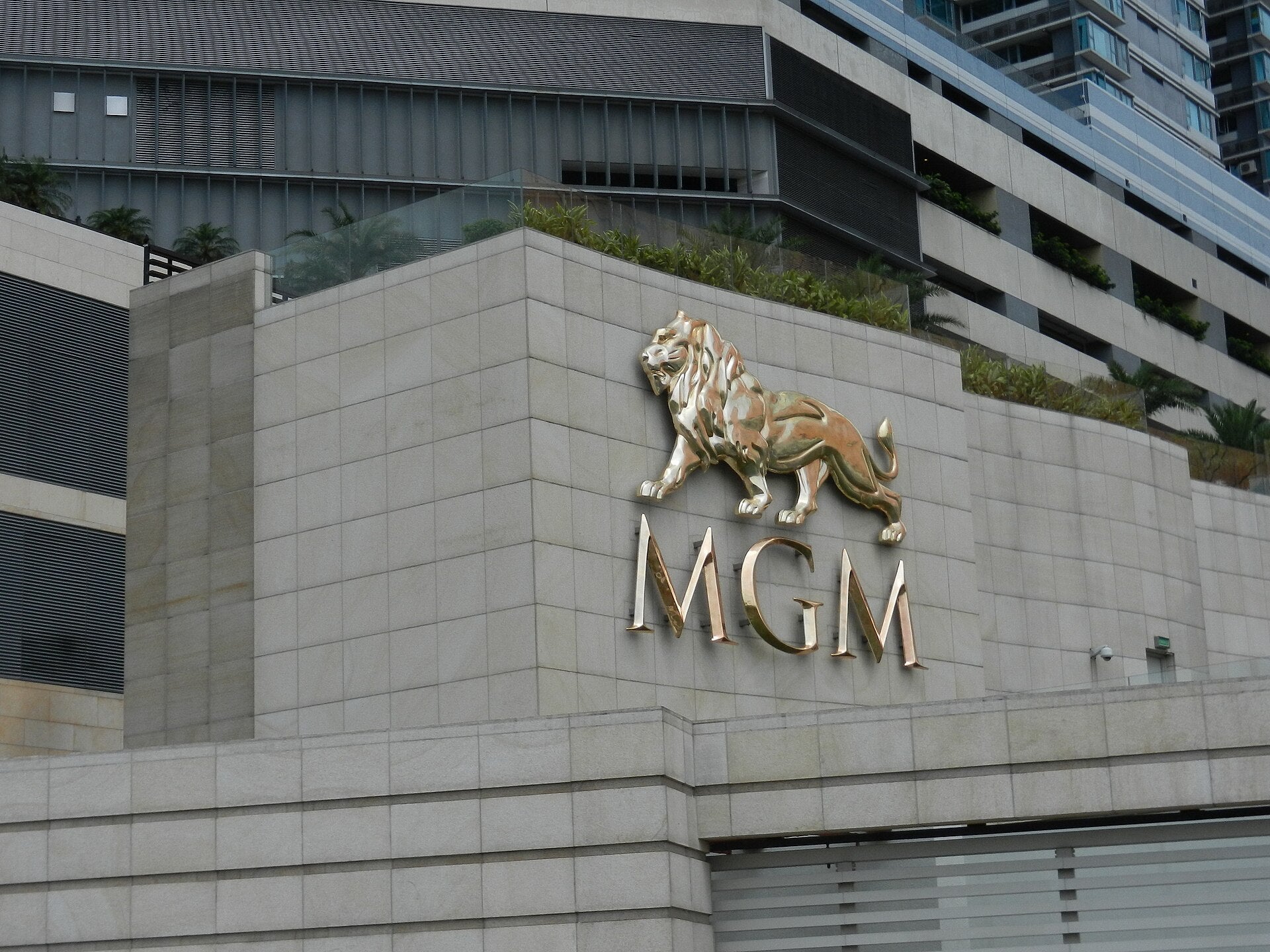 Gold MGM lion logo on the exterior facade of MGM Macau