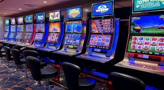 Vibrant Casino Slot Machines Indoors at Night . Free Stock Photo - pexels.com A Row of Slot Machines