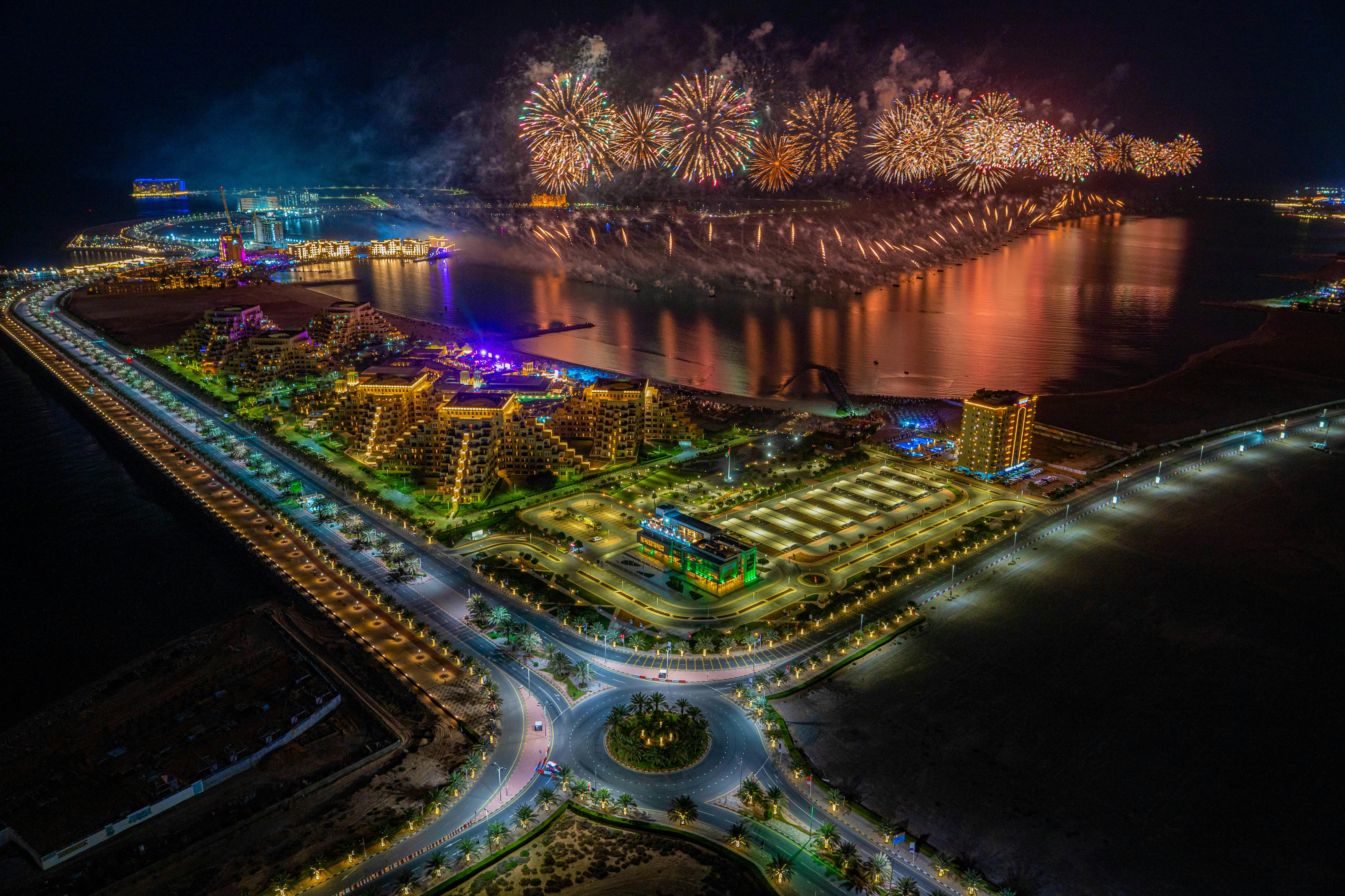 Aerial View of Fireworks Display in Al Marjan Island - pexels.com Aerial View of Al Marjan Island with Fireworks Display