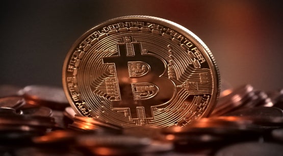 Bitcoin digital currency coin close-up representing decentralized cryptocurrency