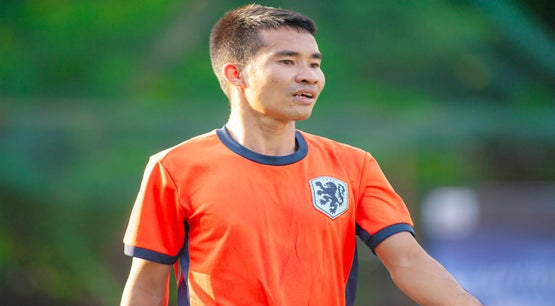 photo of football shirt  and player