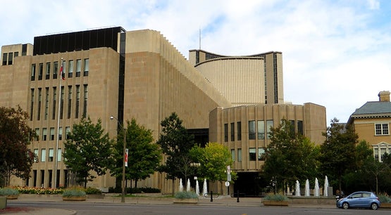 Exterior view of the Ontario Superior Court of Justice and nearby Toronto City Hall buildings in Toronto, Ontario