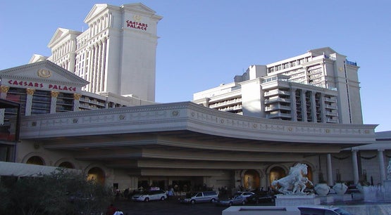 Exterior entrance of Caesars Palace on the Las Vegas Strip linked to Caesars Entertainment takeover interest from Tilman Fertitta