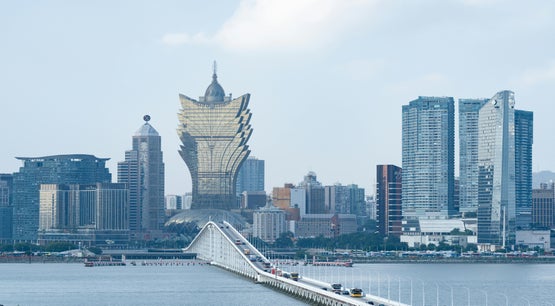 Macau Skyline Featuring Grand Lisboa Casino Resort Skyline of Macau featuring the Grand Lisboa and waterfront bridge