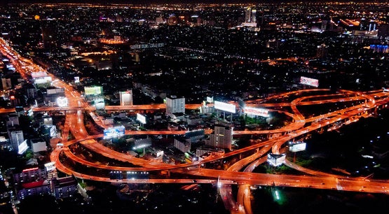 Makkasan Interchange expressway network at night in Bangkok, Thailand