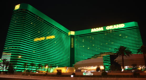 MGM Grand hotel and casino illuminated in green on the Las Vegas Strip at night