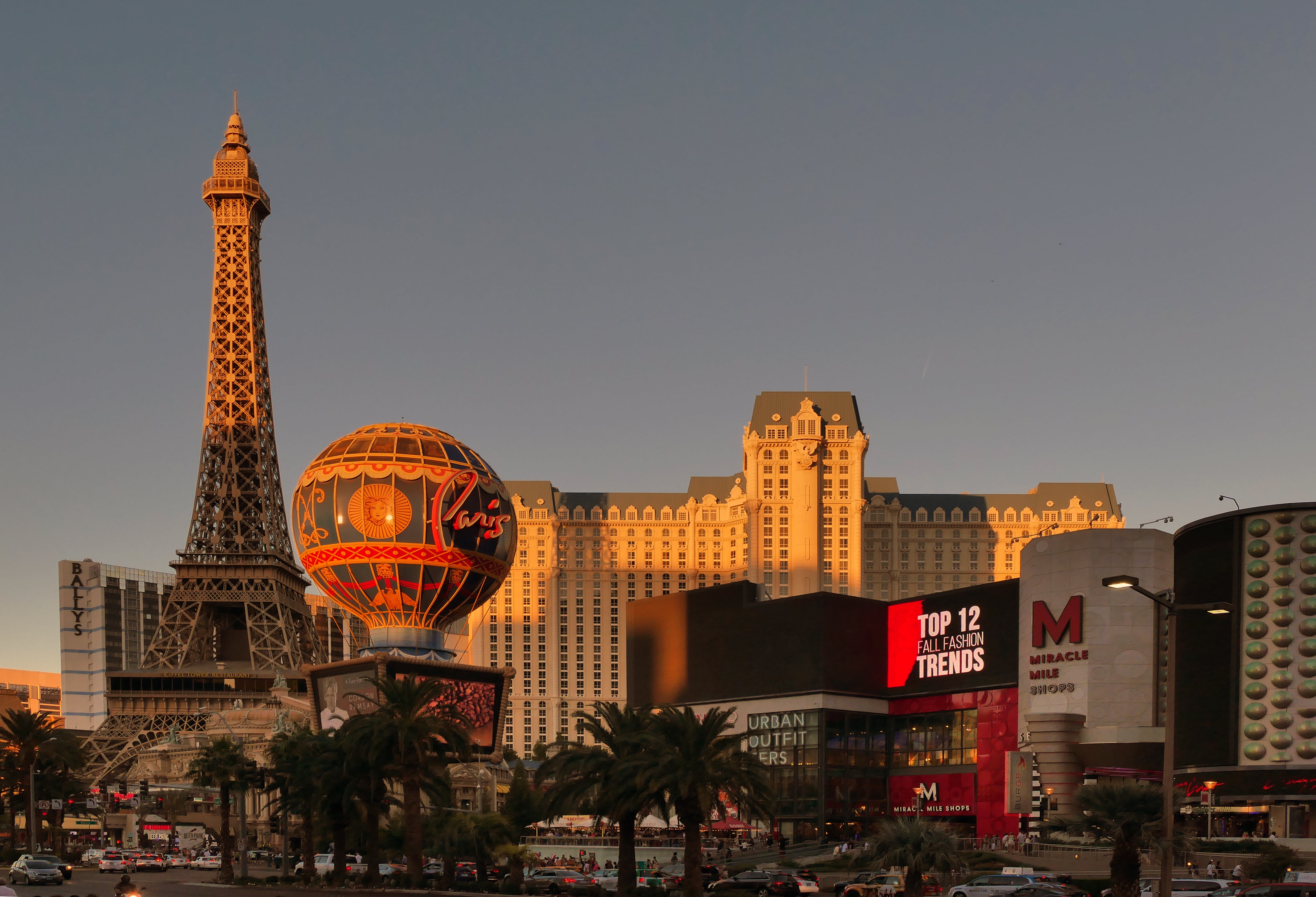 Nevada Gaming Revenue Hits Record $1.3B in April 2026 Paris Las Vegas casino on the Strip at sunset, with the Eiffel Tower replica and hot air balloon visible alongside Bally's and Miracle Mile Shops