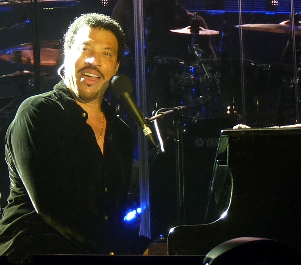 Lionel Richie Adds New Wynn Las Vegas Residency Dates Lionel Richie sings at the piano during a live concert performance