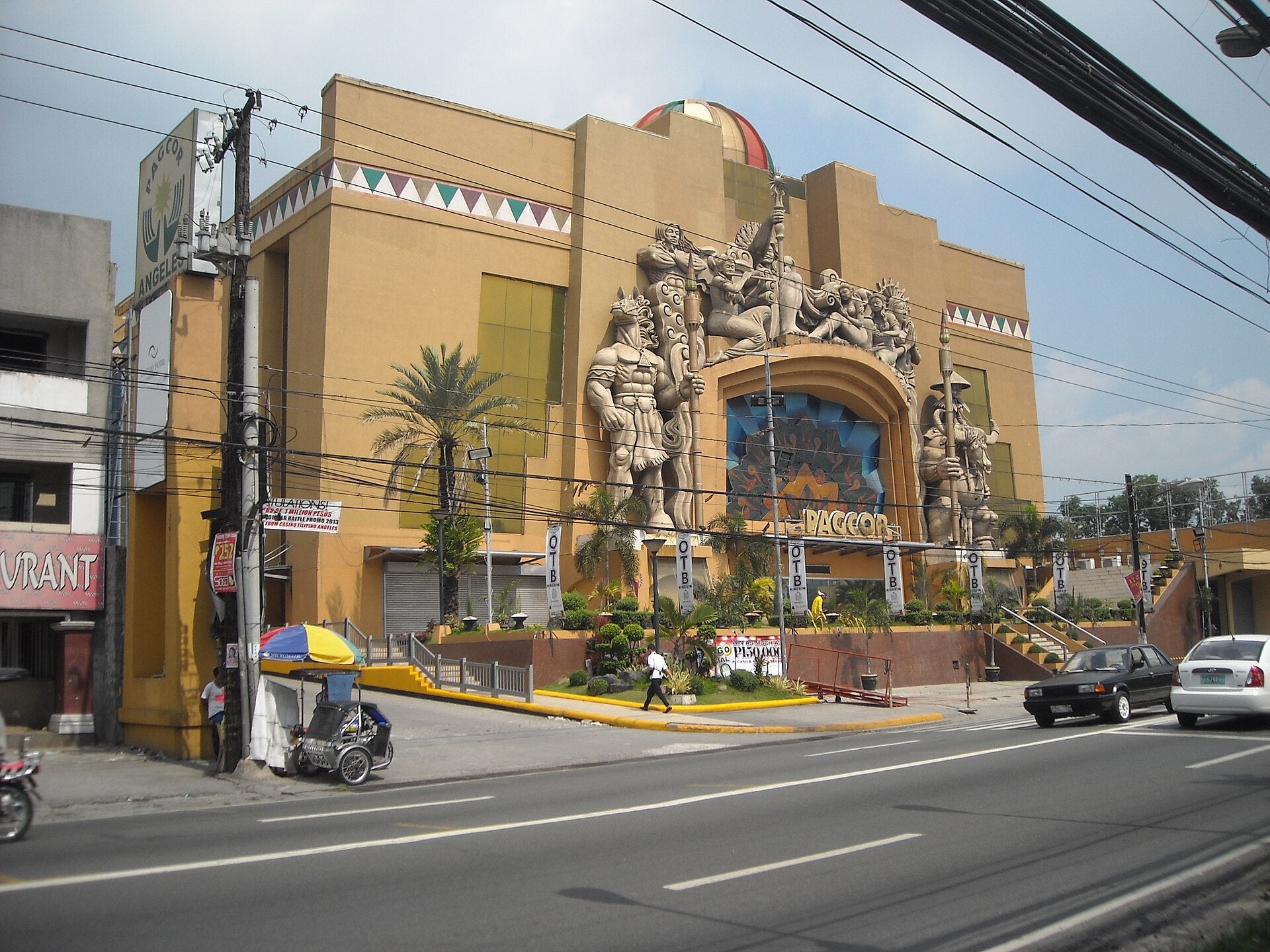 PAGCOR's Casino Filipino Angeles in Pampanga, with large sculptures of Filipino figures above its entrance